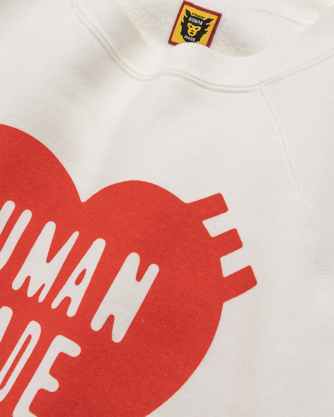 White sweatshirt store with red hearts